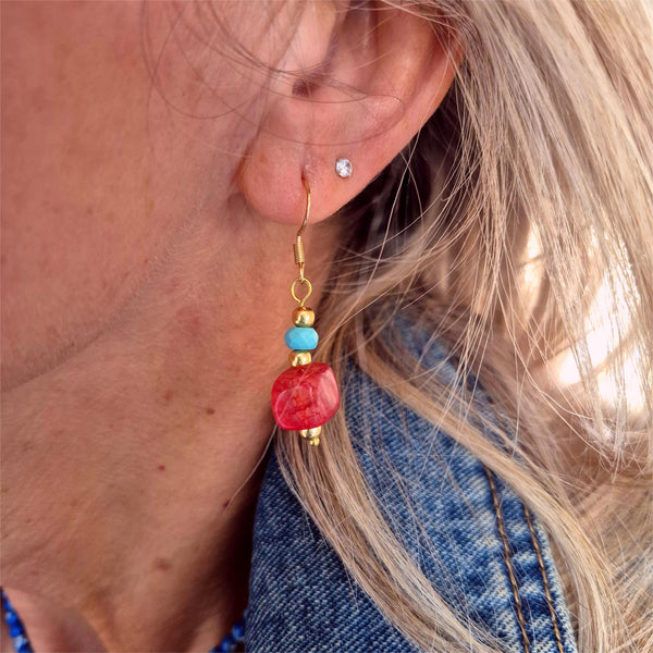 Large crimson agate cubes with turquoise stone discs &amp; gold plated beads make these earrings a playful touch to your outfits! Height from bottom of hook 25mm. Gold Plated Hooks.
