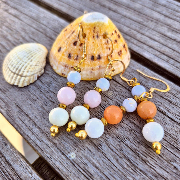 Gorgeous white jade earrings with gold plated accent beads &amp; hooks.
Available in peach or pale pink.
Length from bottom of hook - 40mm
Summer vibes right there!