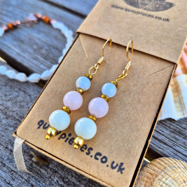 Gorgeous white jade earrings with gold plated accent beads &amp; hooks.
Available in peach or pale pink.
Length from bottom of hook - 40mm
Summer vibes right there!