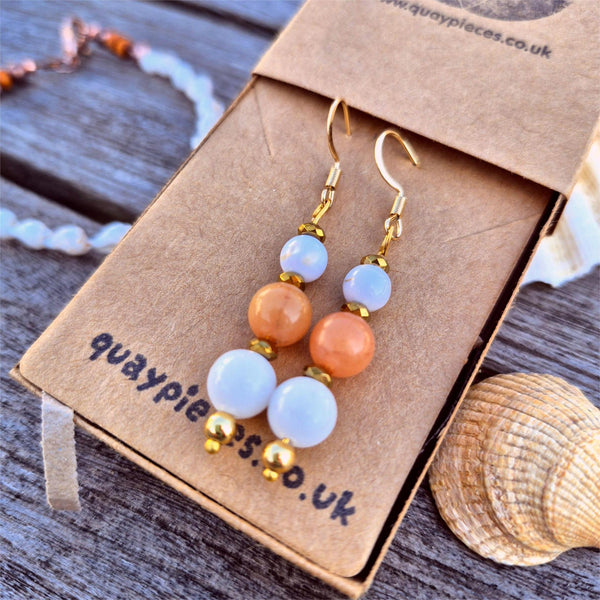 Gorgeous white jade earrings with gold plated accent beads &amp; hooks.
Available in peach or pale pink.
Length from bottom of hook - 40mm
Summer vibes right there!