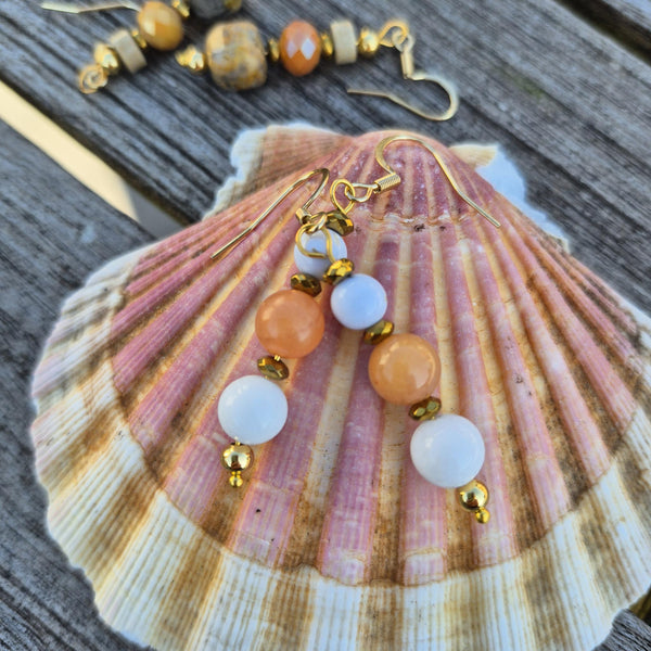 Gorgeous white jade earrings with gold plated accent beads &amp; hooks.
Available in peach or pale pink.
Length from bottom of hook - 40mm
Summer vibes right there!