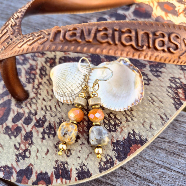 Lovely peach cream tones in these handmade agate cube earrings, featuring a faceted glass bead and natural stone disc. Gold plated accent beads and hooks add a vintage feel.
Length from bottom of hook - 30mm

A perfect gift or spring wardrobe essential.