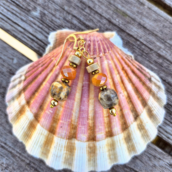 Lovely peach cream tones in these handmade agate cube earrings, featuring a faceted glass bead and natural stone disc. Gold plated accent beads and hooks add a vintage feel.
Length from bottom of hook - 30mm

A perfect gift or spring wardrobe essential.