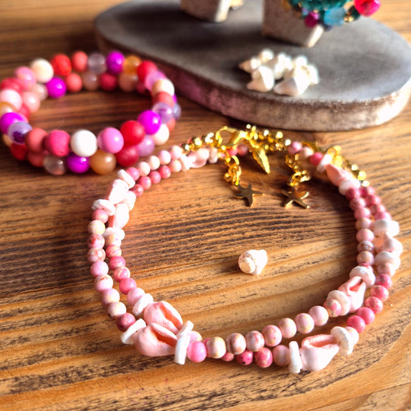 Lovely pastel pink anklet, handmade with 4mm imperial jasper beads, shell discs and pink spiral shells. Perfect for beach wear and summer styling, this delicate piece features gold-plated fastenings, a lobster clasp, and a charming conch shell and star charm (nickel free). Adjustable from 24cm to 27cm with an extension chain.&nbsp;