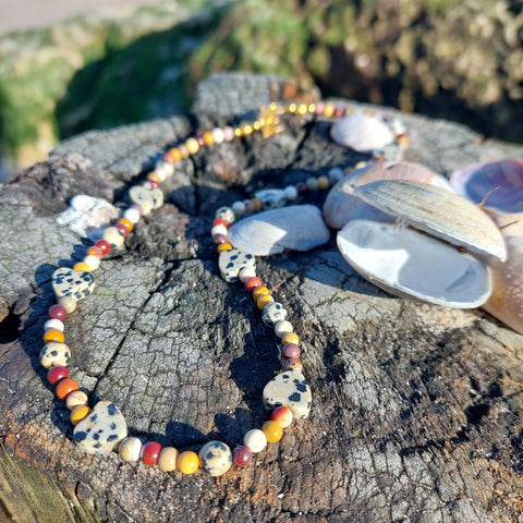 ﻿Add a bit of autumnal colour to your wardrobe with this cute necklace 4mm agate beads, gold plated hematite & dalmatian stone hearts with gold plated fastenings & star charm. Length - 42cm Super little addition to your Winter wardrobe! **Presented in lovely Kraft paper gift box with reusable organza pouch**