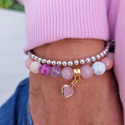 Gorgeous pastel Ice cream colours in this cute stone bead bracelet 8mm matt & gloss beads in pink, peach, white & greys with gold & pink stone heart  Elasticated, so will fit most adult wrists (measuring 71/2 in/19cm)  Lovely addition to your Summer outfits!  **Presented in lovely Kraft paper gift box with reusable organza pouch**