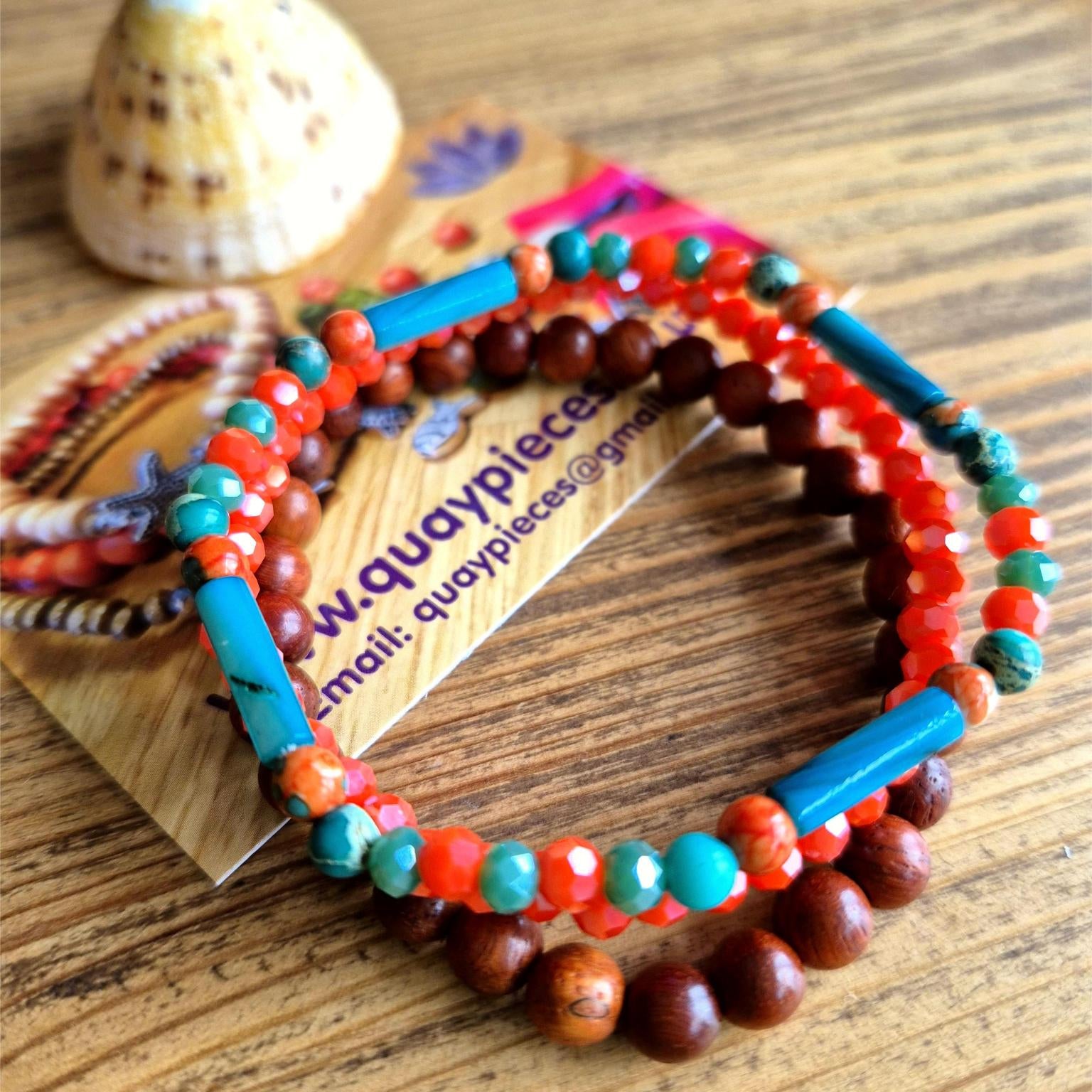 Add a pop of color to your summer looks with these handcrafted, delicate bracelets made with 4mm &amp; 6mm beads. Each one is unique, featuring turquoise &amp; orange stone beads with shell tubes, coral faceted glass, and natural waxed wood. They fit most adult wrists perfectly with their close-fitting elastic design (measuring 7.5 in/19cm). Perfect for adding a touch of fun and flair to your summer wardrobe!