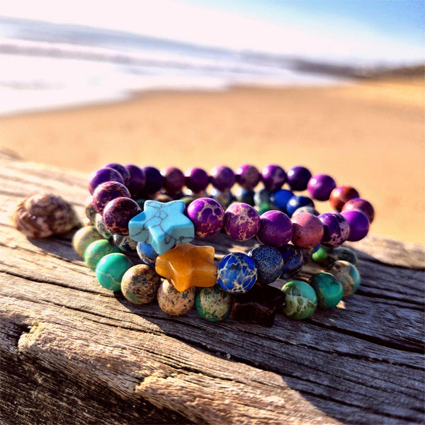 Lovely 8mm bracelets feature beautiful imperial jasper beads paired with a striking contrasting stone star—a delightful pop of personality on your wrist. Whether you're reaching for everyday sparkle or searching for the perfect gift to brighten a friend's day, these playful pieces bring joy to any moment. Each bracelet is lovingly made to celebrate individuality and add a touch of whimsy to your style.