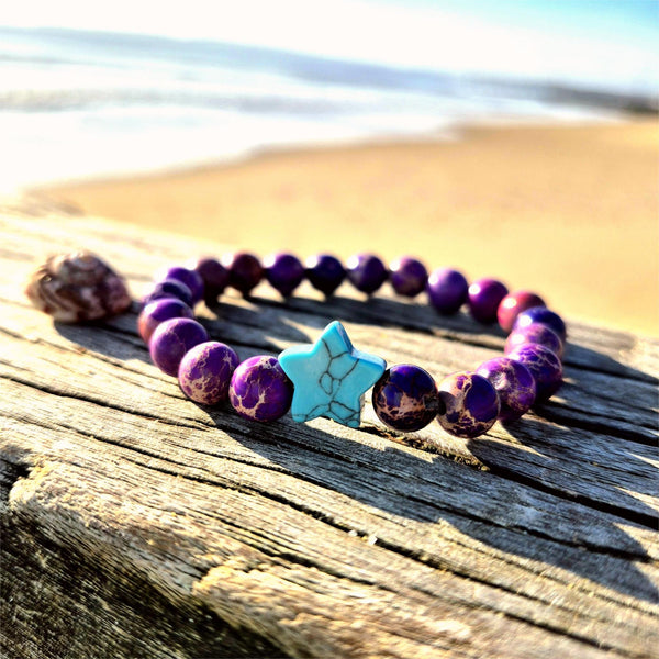 Lovely 8mm bracelets feature beautiful imperial jasper beads paired with a striking contrasting stone star—a delightful pop of personality on your wrist. Whether you're reaching for everyday sparkle or searching for the perfect gift to brighten a friend's day, these playful pieces bring joy to any moment. Each bracelet is lovingly made to celebrate individuality and add a touch of whimsy to your style.